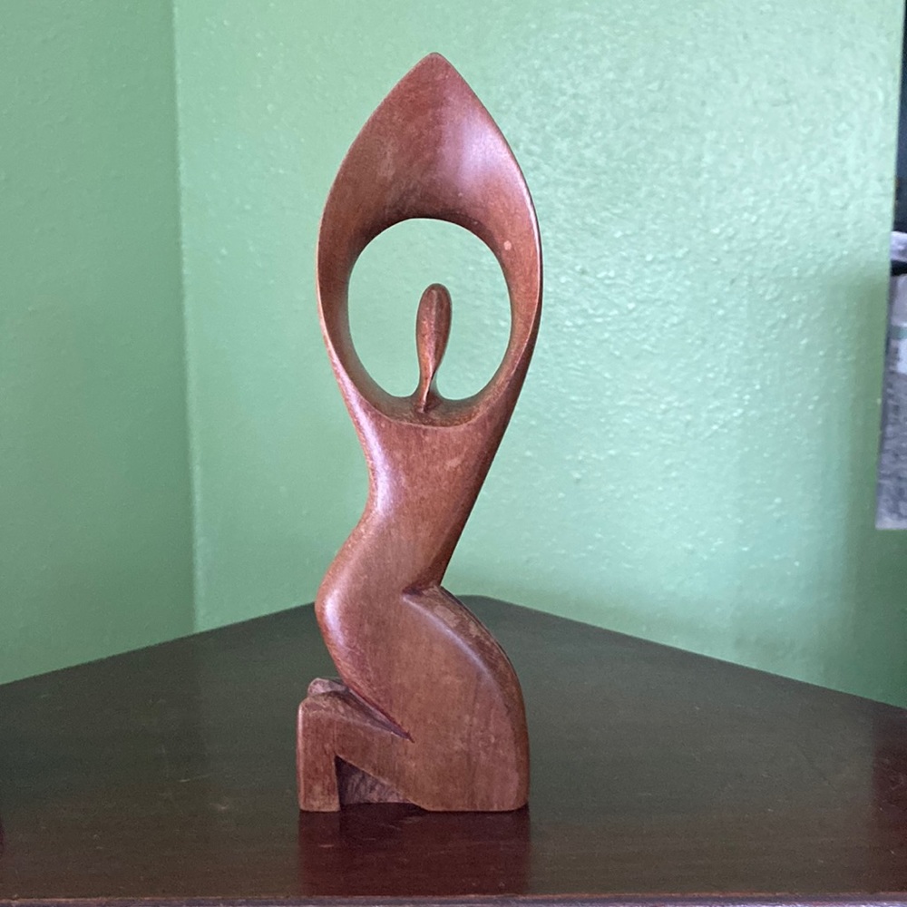 Hand carved woman statue
